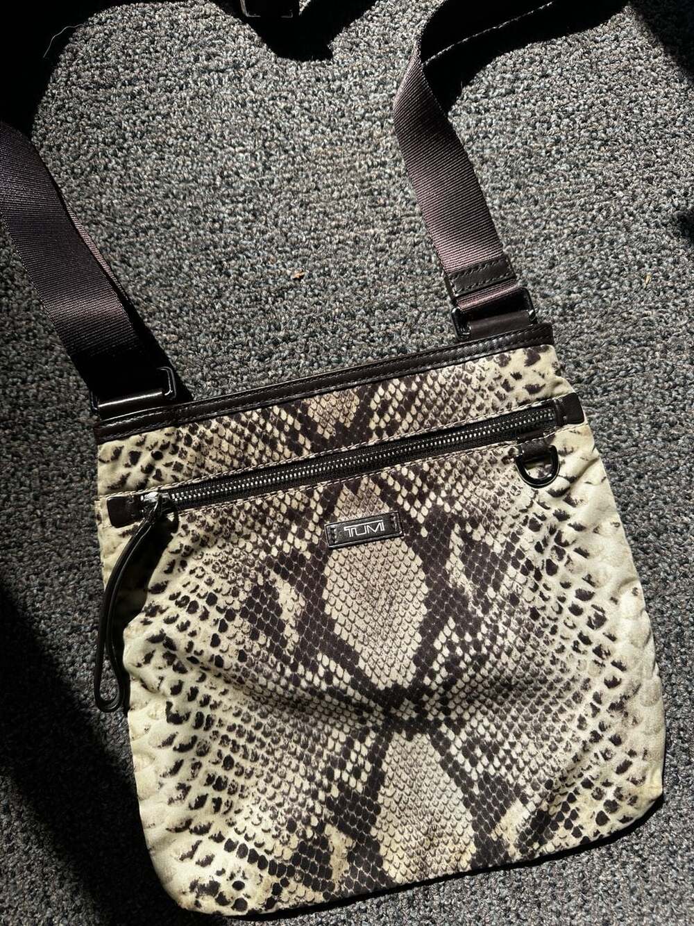 Tumi Voyageur Nylon Crossbody Bag, brown and cream snakeskin pattern.